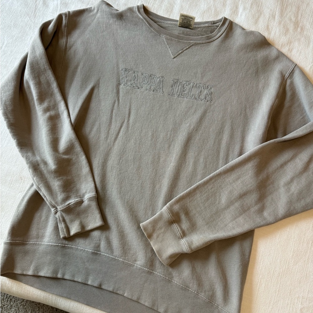 Grey Kappa Delta Crewneck with small hole in wrist area